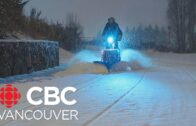 Cyclist clears way with homemade bicycle snowplow